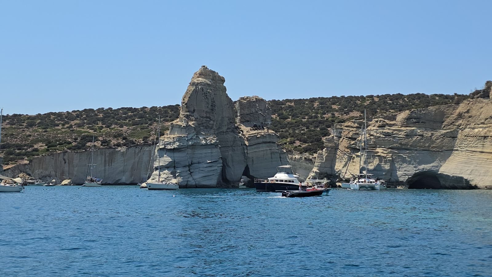 Crystal clear turquoise waters in Milos